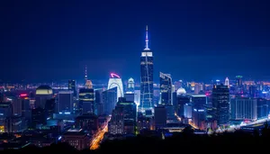 Modern Skyline at Night with Reflection on River