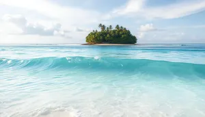 Tropical Beach Paradise with Calm Waves and Clear Sky.