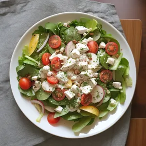 Delicious Gourmet Salad with Fresh Vegetables and Cheese