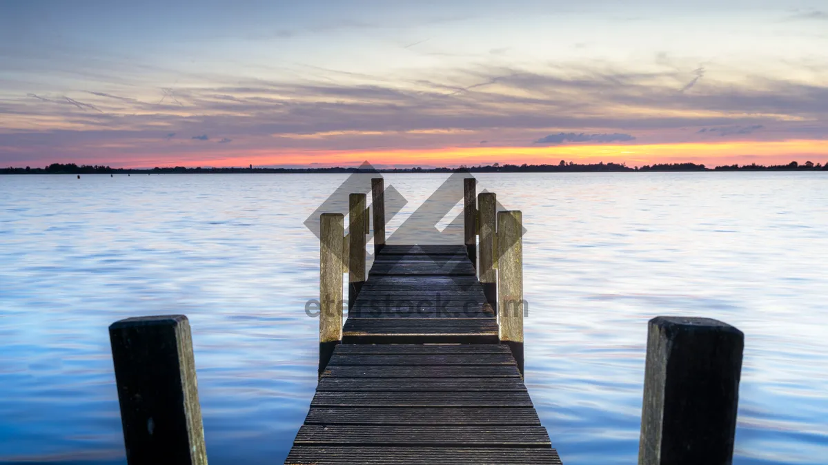 Picture of Tropical paradise boat dock by the wooden pier