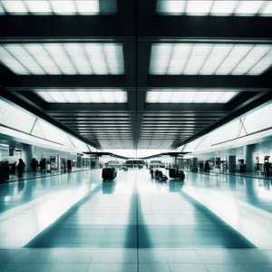 Modern Urban Transport Hub: A Futuristic Glass Corridor