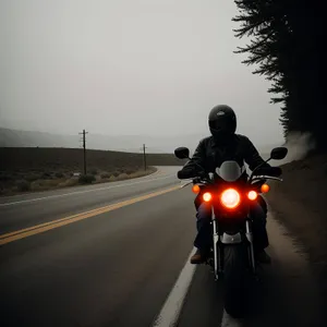 Scenic Speed: Motor scooter cruising on an expressway.