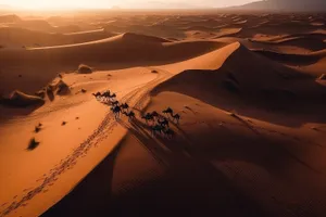 Orange sky over sandy dunes in Morocco