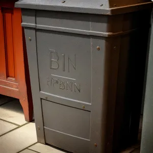 Modern wooden kitchen cabinet with mailbox decor.