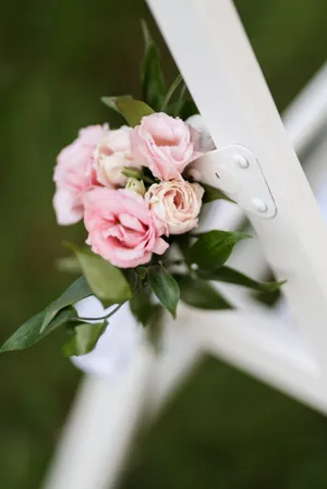 Romantic wedding bouquet with pink roses and jasmine flowers.