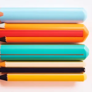 Vibrant Rainbow-Colored Pencils in an Artistic Display