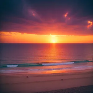 Golden-Hued Sunset Over Beach and Ocean