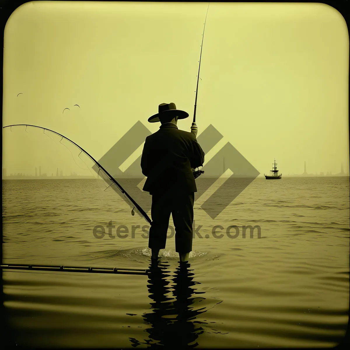 Picture of Fisher's Sunset Adventure: Silhouette of Man Fishing at Sunset