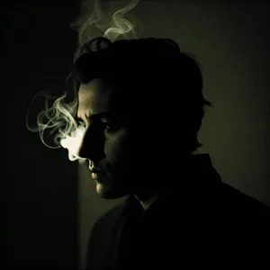 Stylish Dark Portrait of Attractive Male Musician with Microphone