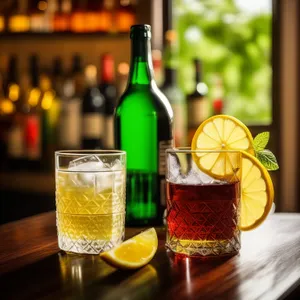 Party Table with Various Alcoholic Beverages and Glasses