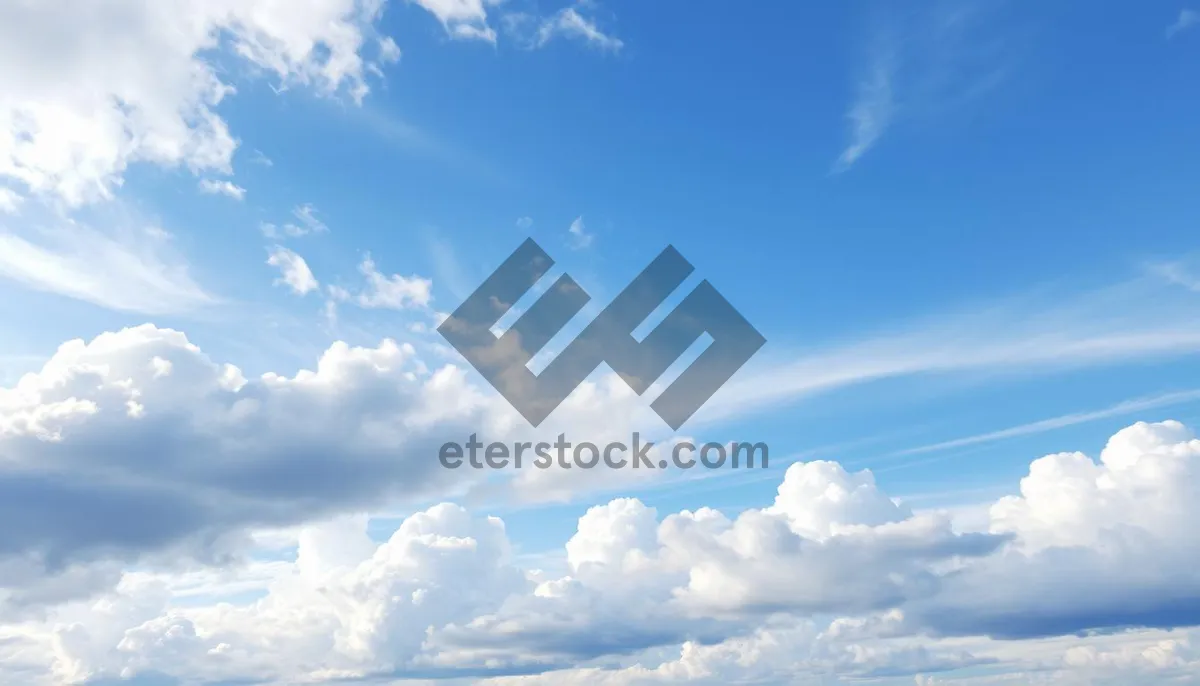 Picture of Vibrant Summer Sky with Fluffy Clouds