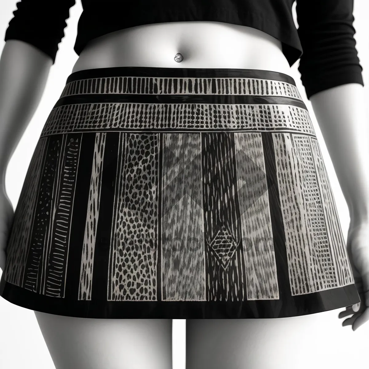 Picture of Stylish brunette model exuding confidence in fashionable miniskirt
