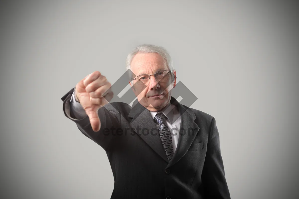 Picture of Smiling businessman in modern office setting