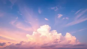 Summer sky with bright sunlight and fluffy clouds