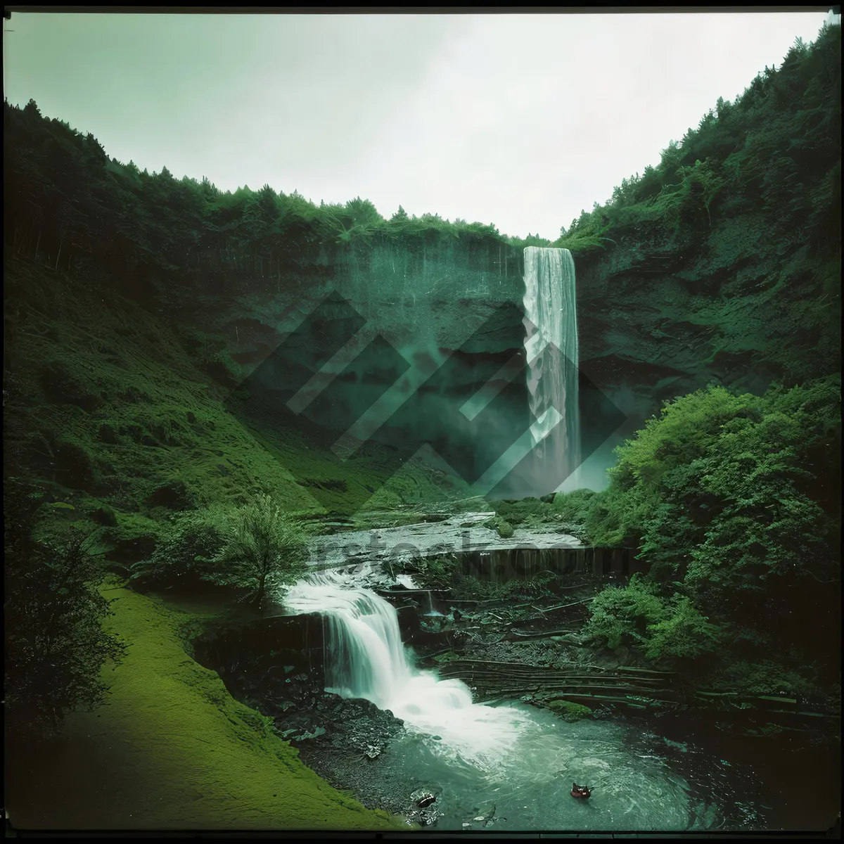 Picture of Mountain River Flowing Through Scenic Wilderness