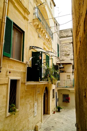 Historic city street with old stone buildings.