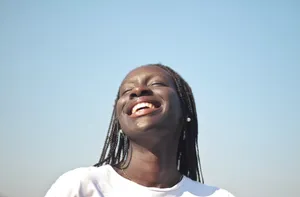 Happy Black Male Portrait with Cheerful Smile