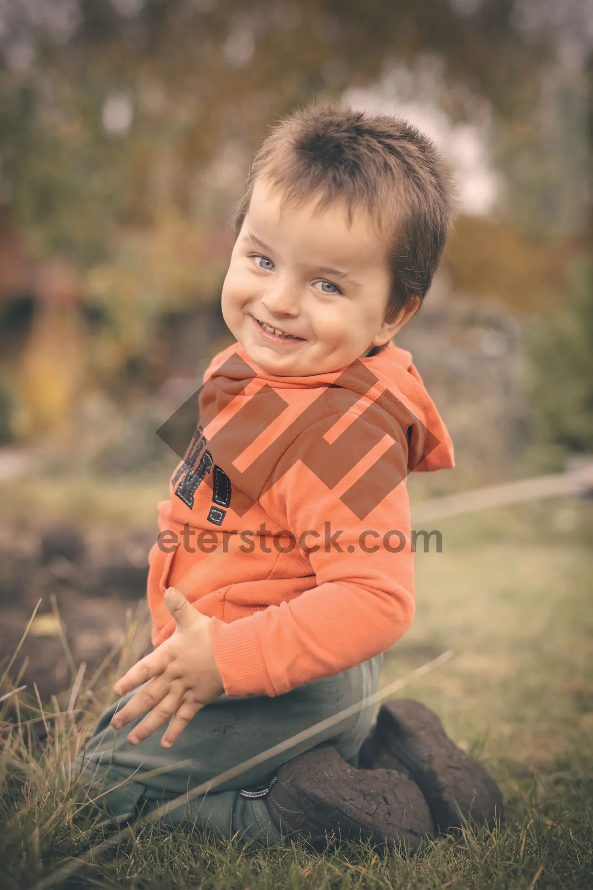 Picture of Happy Family in the Park Smiling Together