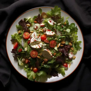 Fresh vegetable salad with gourmet dressing in bowl