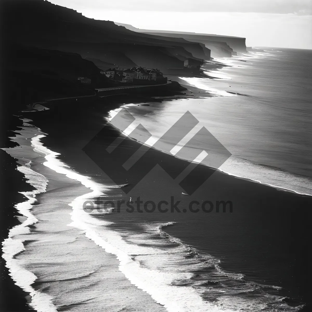 Picture of Serene Coastal Waterfront with Breakwater Barrier