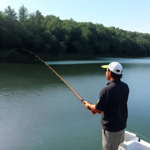 Golfer casting his line into the lake.