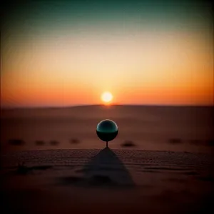 Golden Horizon: Sunset Reflection on Tropical Beach
