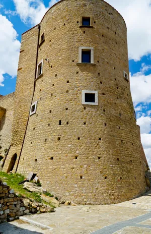 Ancient Castle Tower Against Blue Sky