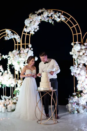 Happy Wedding Couple with Bouquet