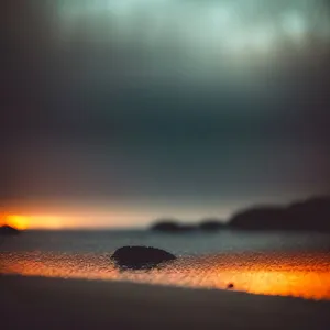 Majestic Sunset Over Tranquil Ocean Beach