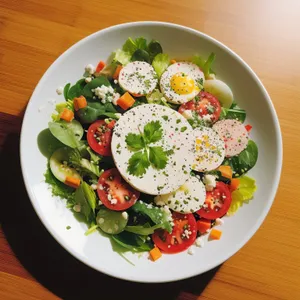 Gourmet vegetable salad with cheese and sauce