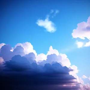 Cloudscape over sunny azure skies