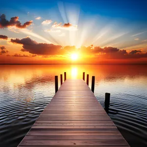 Tropical sunset over serene beach with boat docked