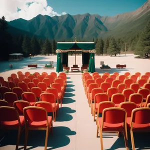 Empty restaurant interior with folding chairs and tables.