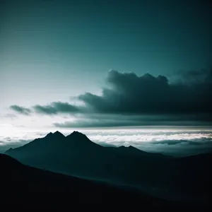 Serene Sunset over Majestic Mountain Range