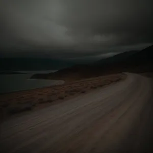 Serenity in the Sands: Desert Sunset Over Horizon