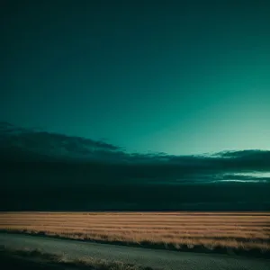 Majestic Coastal Sunset over Ocean Horizon