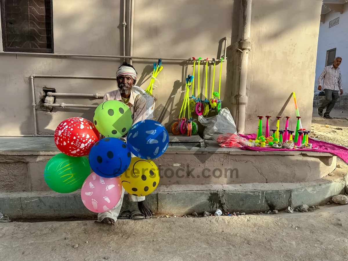 Picture of Festive seller with holiday decorations and piggy bank