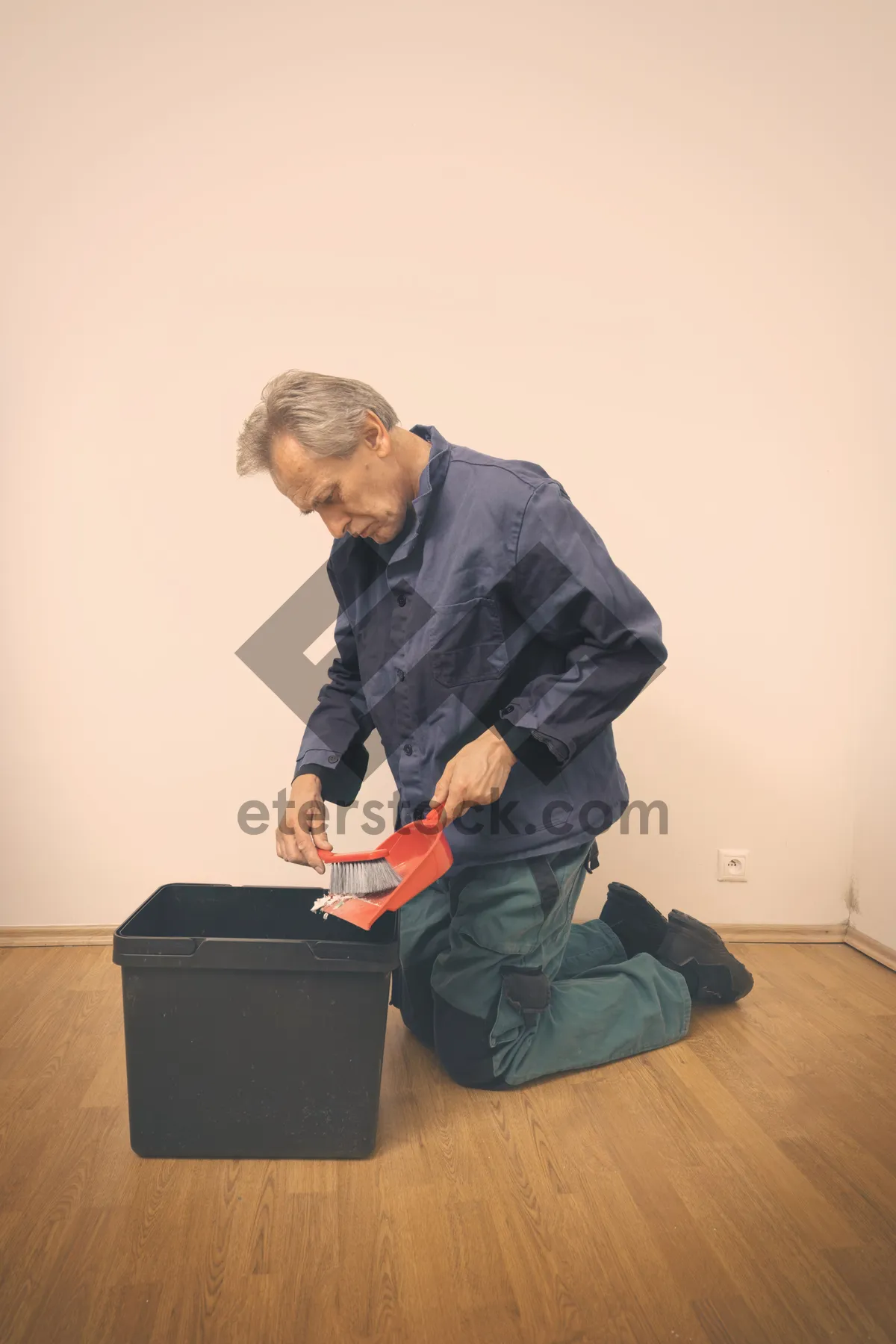 Picture of Smiling businessman working on laptop in office.