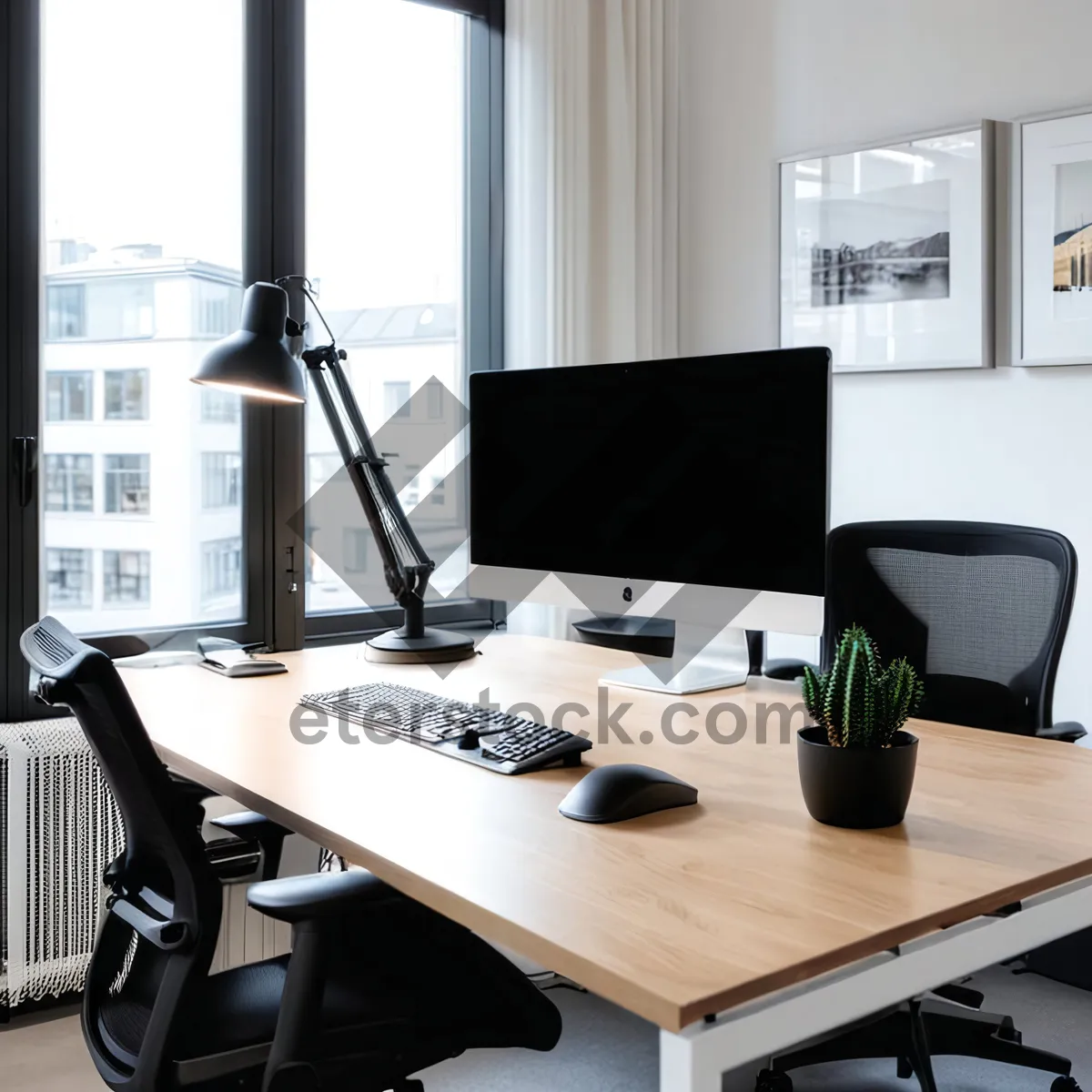 Picture of Modern office desk with laptop and monitor