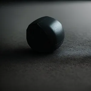Round Black Pool Ball on Table