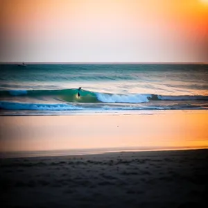Sunset Serenity: Tranquil Beachscape Silhouette