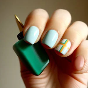 Close-up of a manicured hand with rubber eraser for nail treatment