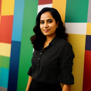 Smiling brunette businesswoman, professional and attractive.