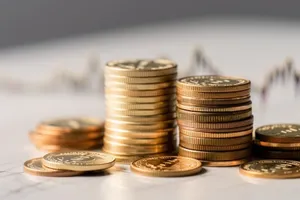 Golden stack of coins symbolizing wealth and success.