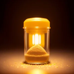 Golden Time: Glass Hourglass with Heated Drink