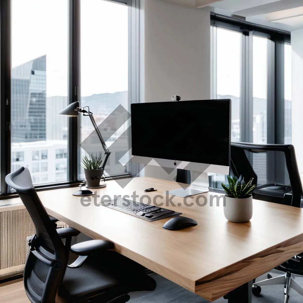 Picture of Modern office desk with computer and keyboard