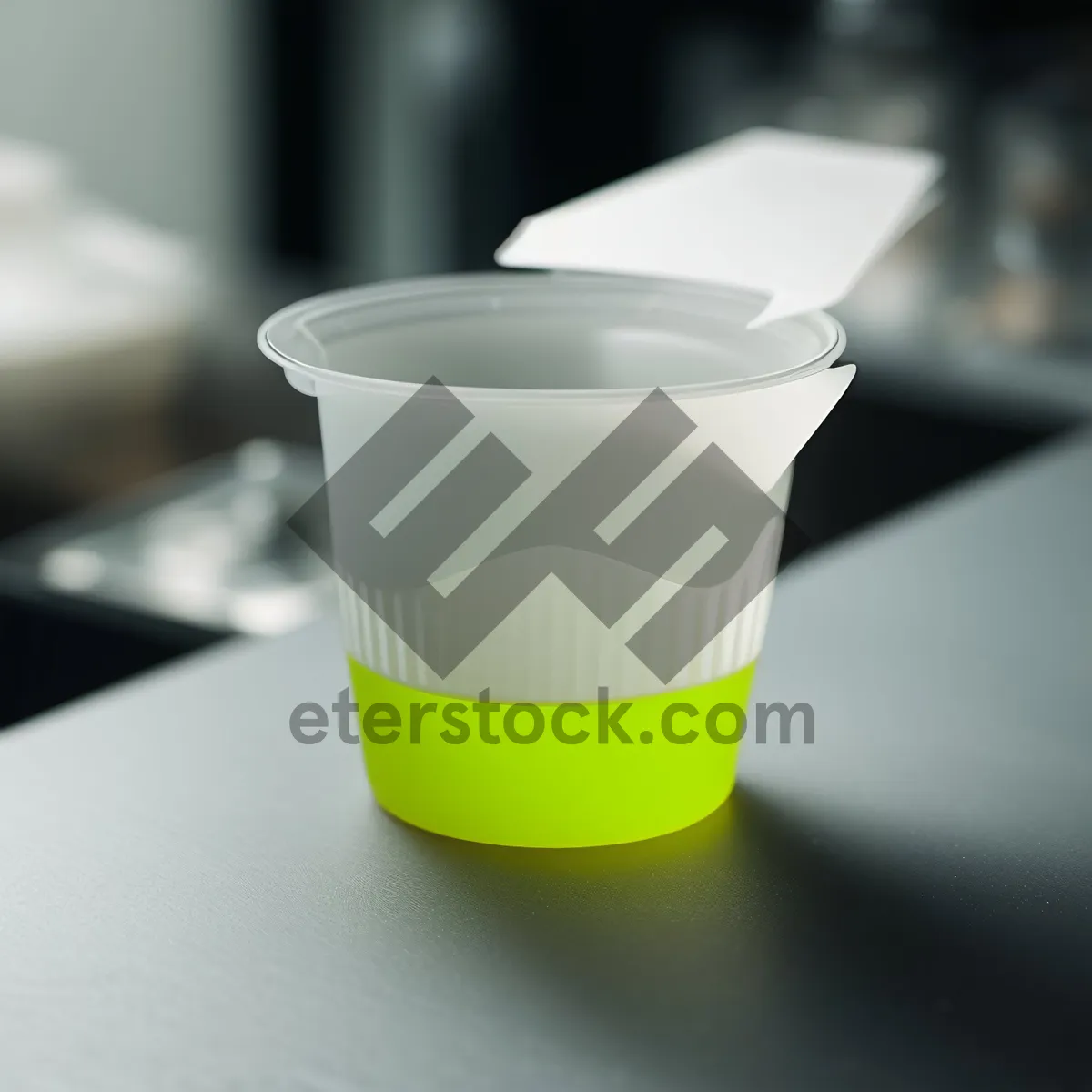 Picture of Measuring cup with coffee and tea on saucer