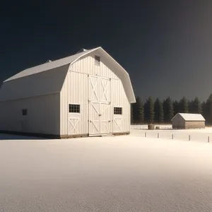 Charming Winter Barn Under Snowy Sky