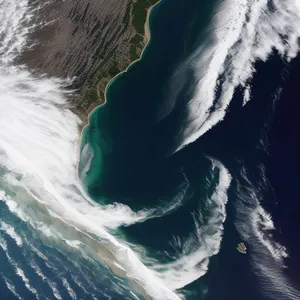 Dancing Waves: Surfer Riding the Ocean's Splash