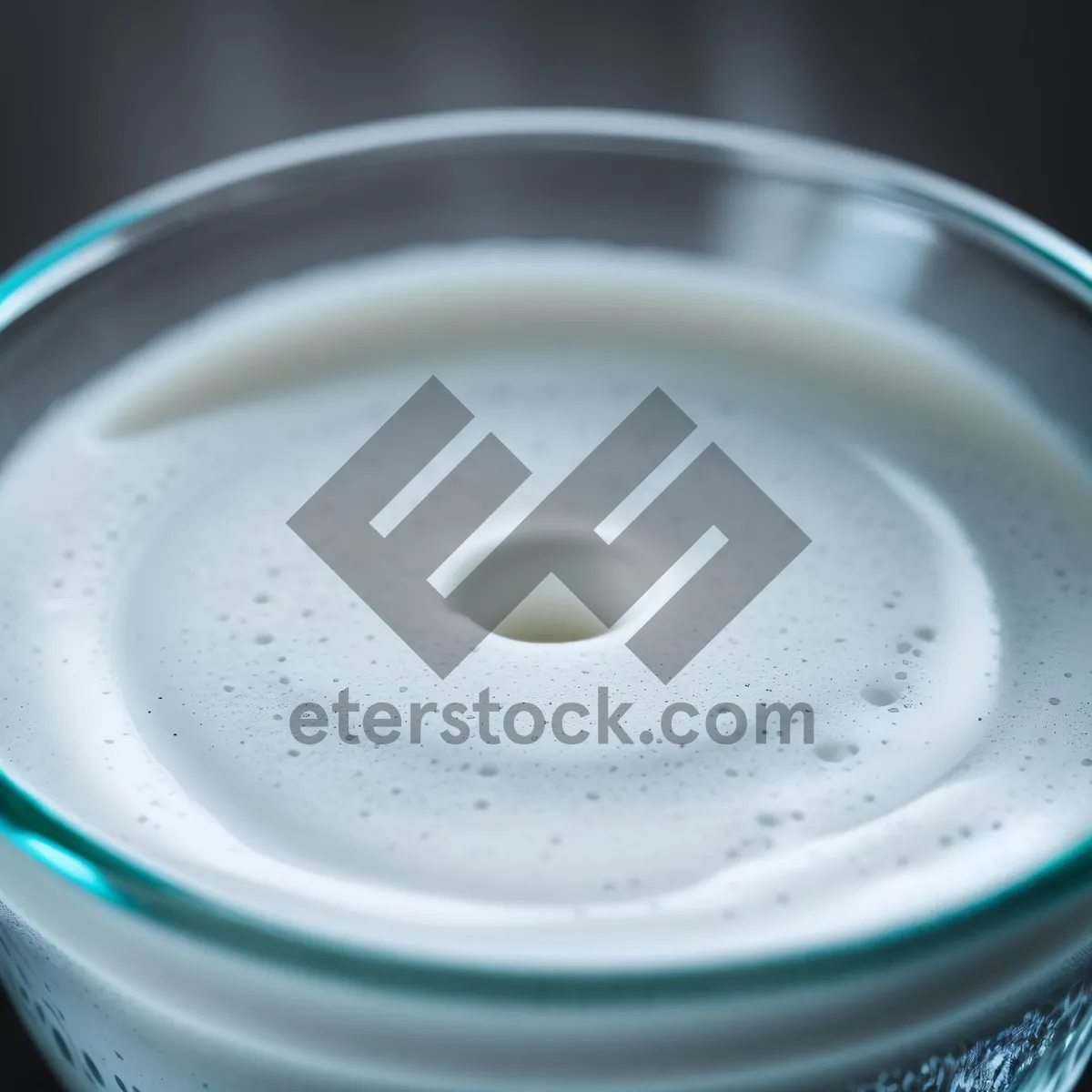 Picture of Refreshing Liquid Ripples in Clean Container